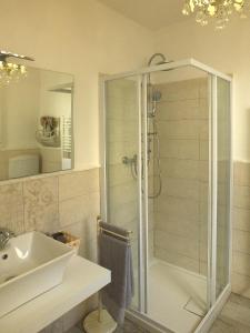 a bathroom with a shower and a sink at Antica Loggetta in Ravenna +25 photos