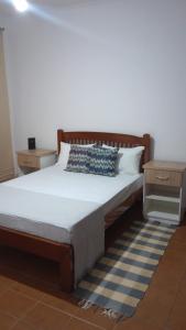 En eller flere senge i et værelse på Hostel Casa Azul