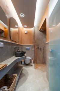 Ένα μπάνιο στο Green Sea Villas