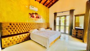 Postel nebo postele na pokoji v ubytování Leo Villas + 5 fotografií