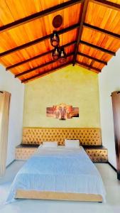 Postel nebo postele na pokoji v ubytování Leo Villas