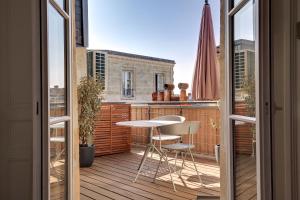 En balkong eller terrass på Appartements Place Gambetta - YBH