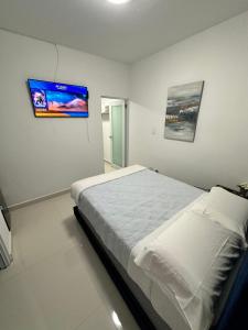 Postel nebo postele na pokoji v ubytování Kantares Guest 4 min Airport + 25 fotografií