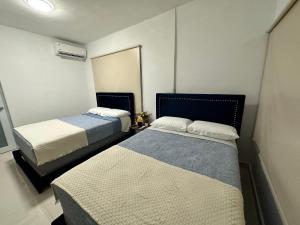 Postel nebo postele na pokoji v ubytování Kantares Guest 4 min Airport