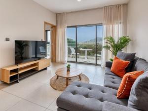 Un televizor și/sau centru de divertisment la Minissy luxury Serviced Apartment