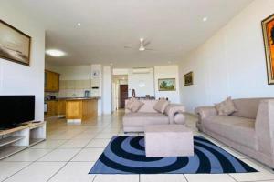 a living room with two couches and a tv at Colonial Sands 8 sleeper with Jacuzzi in Margate