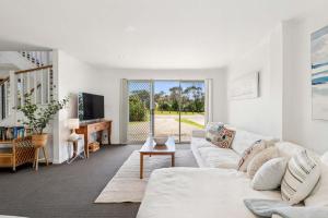 Χώρος καθιστικού στο Sandy's Getaway