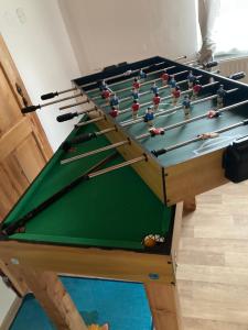 a large pool table with snooker balls on it at Černý Důl 241 in Černý Dŭl +8 photos