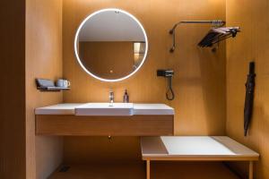 Koupelna v ubytování All Seasons Hotel Qingdao North Bus Station Xianjiazhai Metro Station + 9 fotografií