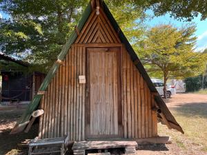 a small building with a door on top of it at sleepy hut in Pai +37 photos