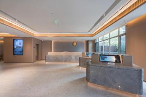 Vstupní hala nebo recepce v ubytování All Seasons Hotel Qingdao North Bus Station Xianjiazhai Metro Station
