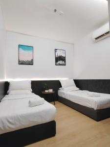 Postel nebo postele na pokoji v ubytování C You Rooms