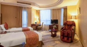 TV a/nebo společenská místnost v ubytování Ramada by Wyndham Wujiaochang Shanghai