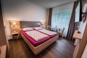 Postel nebo postele na pokoji v ubytování Hotel Baccara + 22 fotografií