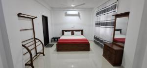 En eller flere senge i et værelse på Bayview resort + 18 billeder