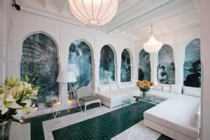Postel nebo postele na pokoji v ubytování Dar Rhizlane, Palais Table d'hôtes & SPA