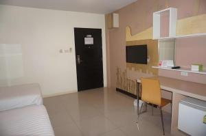 Кухня или мини-кухня в The Rice Hotel
 +139 фотографий