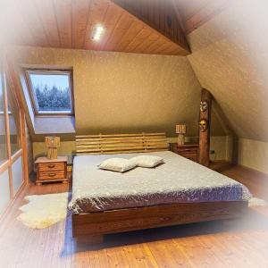 Postel nebo postele na pokoji v ubytování Jauki Lauki