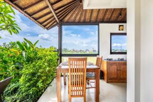 Балкон или терраса в Rumma Lanna Villa by Great Bali Villas