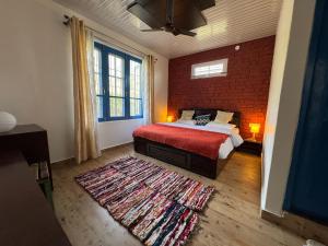 Ένα ή περισσότερα κρεβάτια σε δωμάτιο στο Rishi Casa Blu