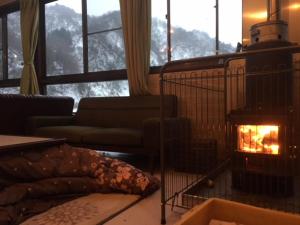 Χώρος καθιστικού στο わくわく自然体験の宿ゲストハウス山楽