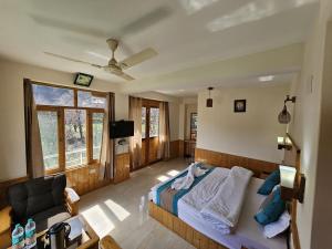 Телевизор и/или развлекательный центр в Purnima Little Italy