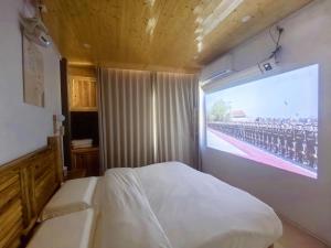 Ένα ή περισσότερα κρεβάτια σε δωμάτιο στο Nostalgia 28 lodge