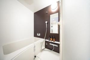 Koupelna v ubytování Private House KANADE + 36 fotografií