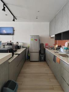 Kuchyň nebo kuchyňský kout v ubytování C You Rooms