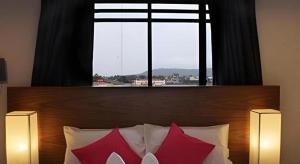 Una cama o camas en una habitación de Iroom Hotel 138 fotos más