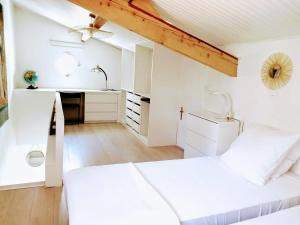 Postel nebo postele na pokoji v ubytování UN OASIS EN PROVENCE