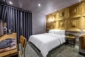 Kuchyň nebo kuchyňský kout v ubytování Gunsan Mari Gyeongjang branch