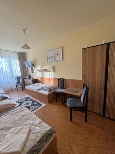 Ένα ή περισσότερα κρεβάτια σε δωμάτιο στο Ośrodek Sportu i Rekreacji w Zawierciu