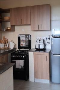 Kuchyň nebo kuchyňský kout v ubytování Lake View House- Shawmut Nakuru