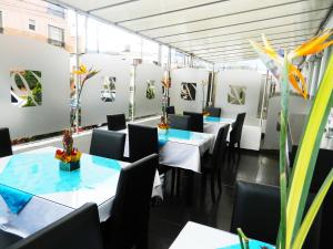Restoran või mõni muu söögikoht majutusasutuses Hotel Bogotá Real