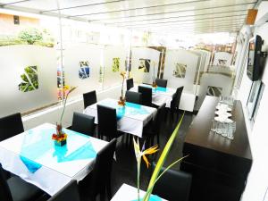 Restoran või mõni muu söögikoht majutusasutuses Hotel Bogotá Real