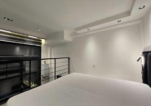 Postel nebo postele na pokoji v ubytování Petit cocon moderne à Akid Lotfi