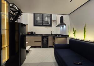 Kuchyň nebo kuchyňský kout v ubytování Petit cocon moderne à Akid Lotfi