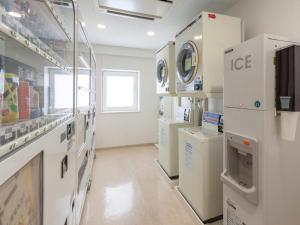 a laboratory with many machines in a room at Comfort Hotel Obihiro in Obihiro