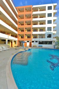 Bazén v ubytování Hotel La Aldea nebo v jeho okolí + 21 fotografií