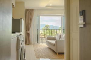 TV a/nebo společenská místnost v ubytování The Terraza Condotel