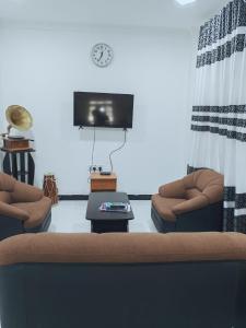 Μια τηλεόραση ή/και κέντρο ψυχαγωγίας στο Rose Fort Homestay