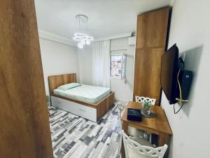 Postel nebo postele na pokoji v ubytování City Centre Apartment