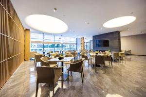 Restaurace v ubytování Jin Yi Youxuan Hotel Ulanqab Wanda Branch 2