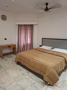 Fotografie z fotogalerie ubytování Falnir Woods v destinaci Mangalúr