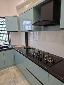 Fotografie z fotogalerie ubytování Falnir Woods v destinaci Mangalúr