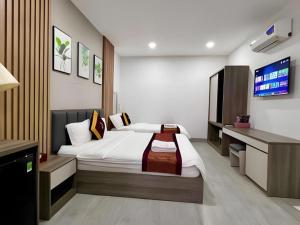 Μια τηλεόραση ή/και κέντρο ψυχαγωγίας στο Hoang Mai Hotel