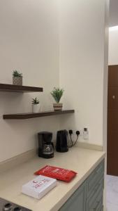 Fotografie z fotogalerie ubytování شقه بغرفه بصاله وغرفه نوم مريحه v destinaci Al Kharj