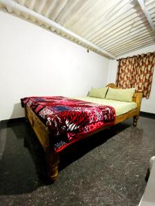 Postel nebo postele na pokoji v ubytování Wild garden home stay + 8 fotografií