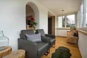 Posezení v ubytování Ferienwohnungen Alpentraum - W 38